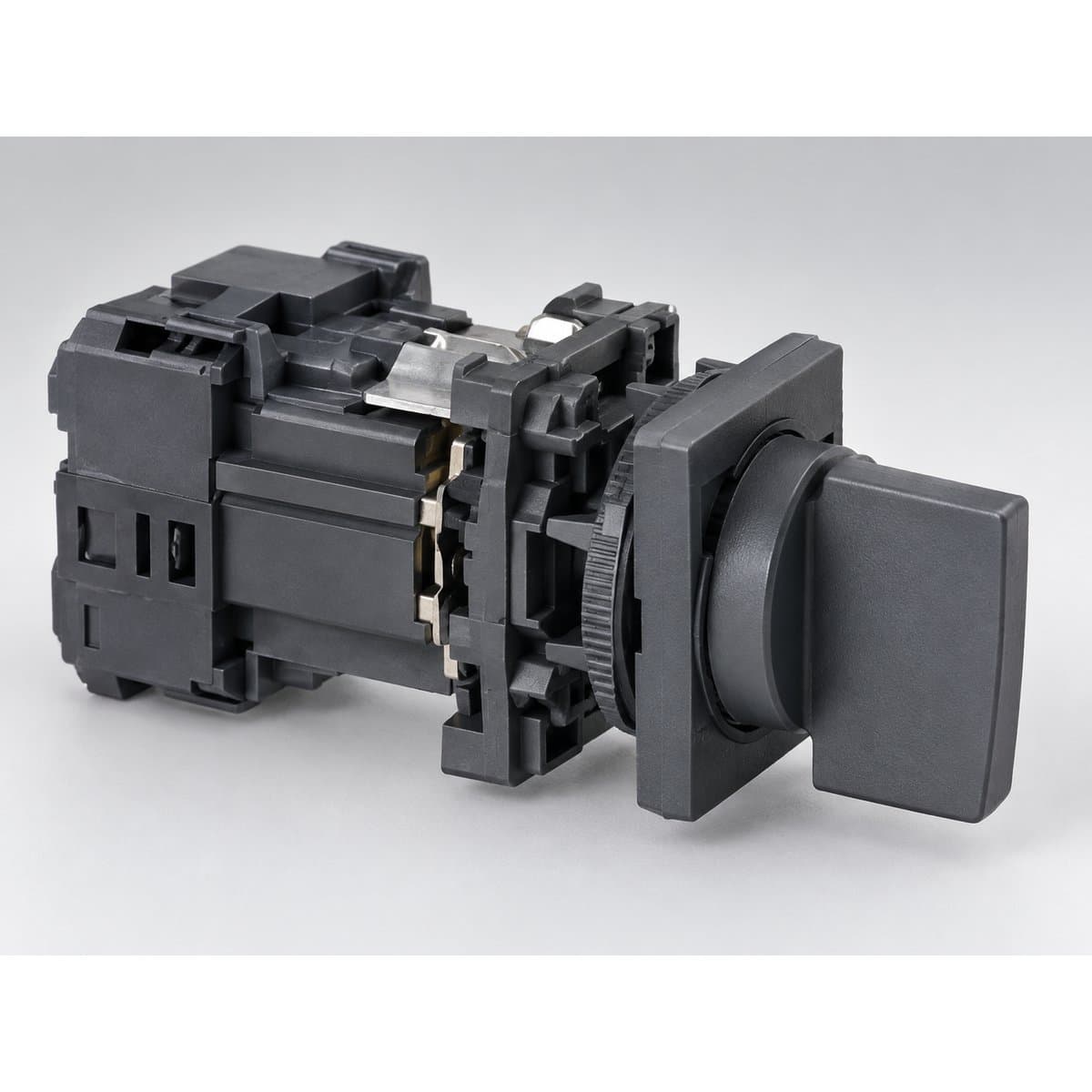 Công tắc cam Harmony K 12A Schneider chụp góc nghiêng 3/4, thấy rõ mặt và cạnh bên