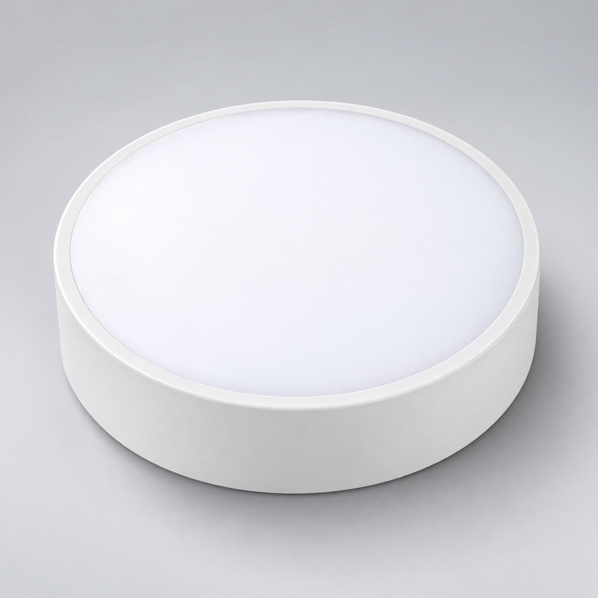 Đèn LED ốp nổi tròn EcoLink chụp góc nghiêng 3/4, thấy rõ thân và cạnh bên